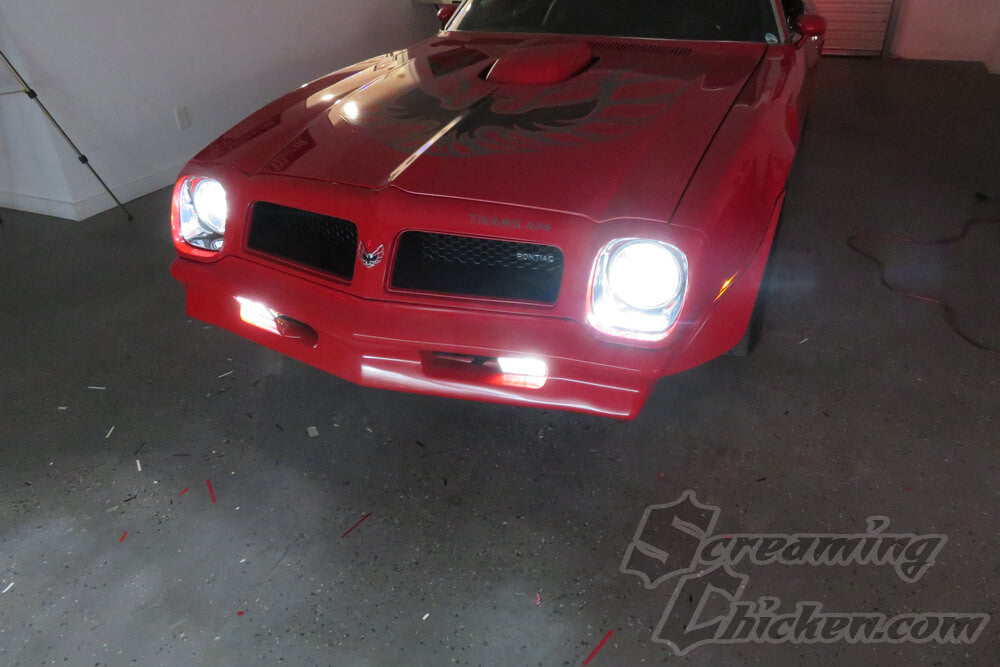 1970-76 Firebird Slim Fit Halo LED Headlight Kit (pair)- illuminated front view