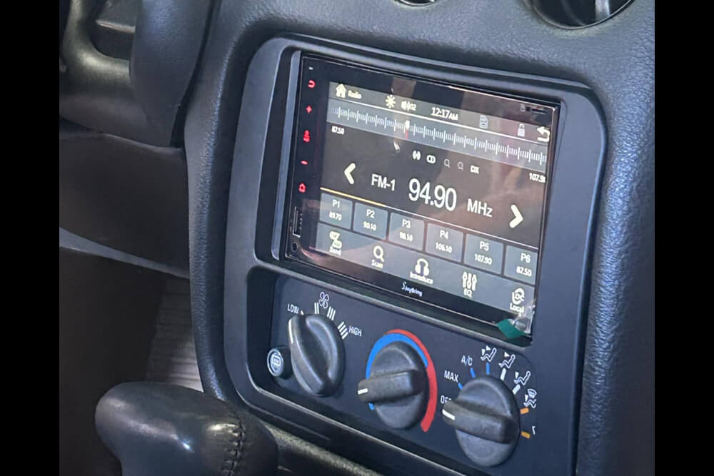 Metra double DIN radio kit installed in fourth-gen Trans Am