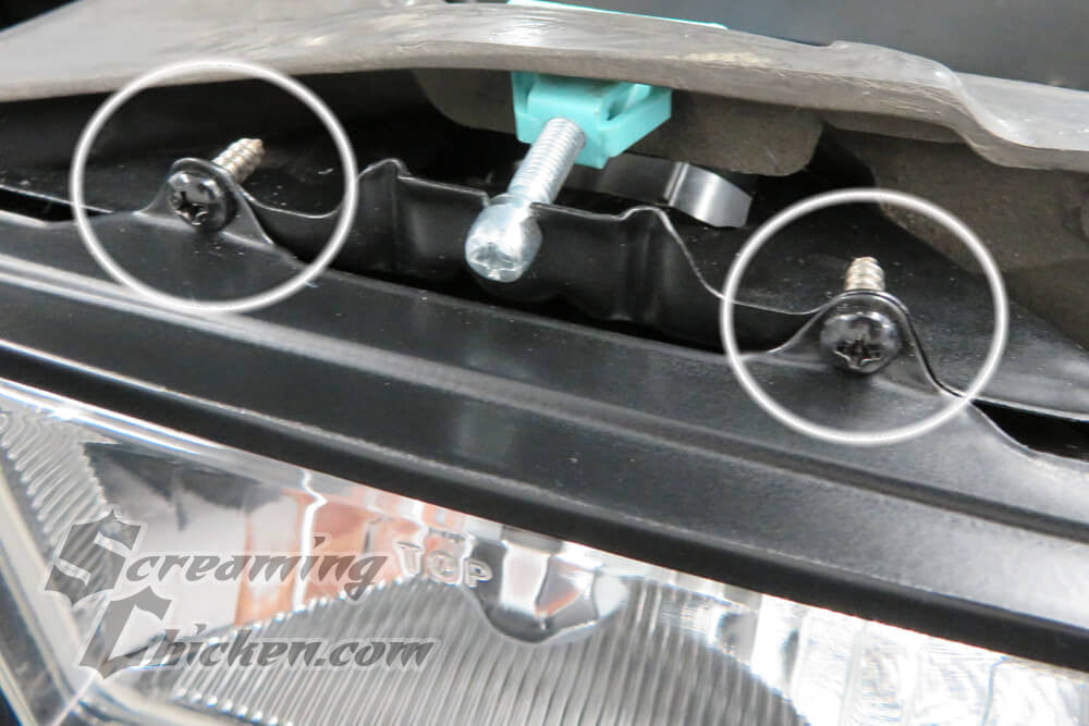 1982-92 Firebird Headlight Mount/Adjust Hardware- screws installed